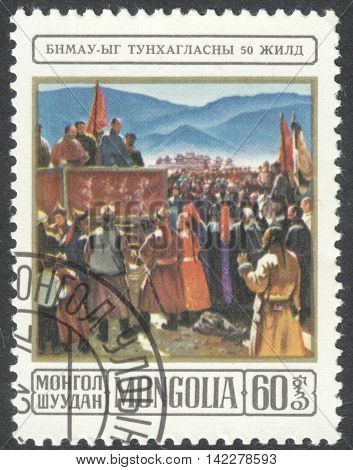 MOSCOW RUSSIA - CIRCA MAY 2016: a post stamp printed in MONGOLIA shows Sukhe Bator proclaiming the Republic the series 