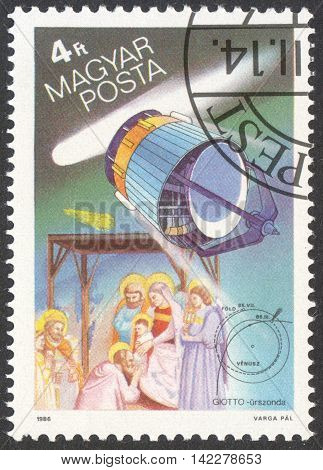 MOSCOW RUSSIA - CIRCA MAY 2016: a post stamp printed in HUNGARY shows a space ship and a comet the series 