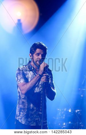 NEW YORK-SEPT 28: Country music artist Thomas Rhett performs at the iHeartRadio Album Release Party with Thomas Rhett on September 28, 2015 at the iHeartRadio Theater in New York City.