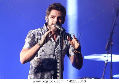 NEW YORK-SEPT 28: Country music artist Thomas Rhett performs at the iHeartRadio Album Release Party with Thomas Rhett on September 28, 2015 at the iHeartRadio Theater in New York City.