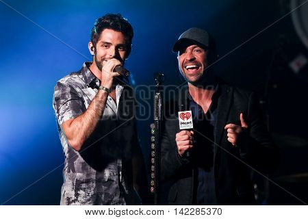 NEW YORK-SEPT 28: Singer Thomas Rhett (L) and radio host Cody Alan at the iHeartRadio Album Release Party with Thomas Rhett on September 28, 2015 at the iHeartRadio Theater in New York City.