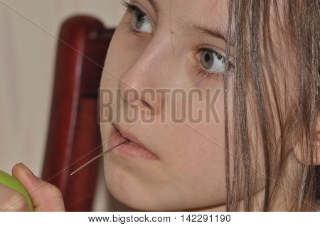 The girl a child doing Christmas decorations. Focus handjob.