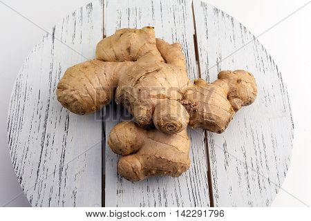 fresh ginger on a white background. fresh ginger on a white background.