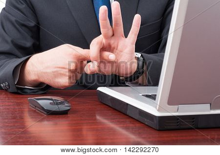 Closeup Of Businessman Hand Simulating Sex