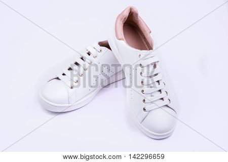 Women's sport leather shoes on white background