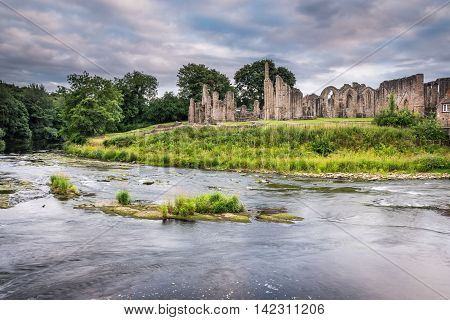 Finchale Priory and River Wear, as it flows past the medieval ruin, in County Durham