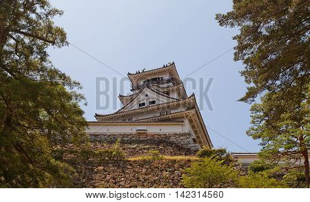KOCHI JAPAN - JULY 19 2016: Main keep (tenshukaku) of Kochi castle (circa 18th c.) Shikoku Island Japan. Kochi is one of only 12 survived castles in Japan