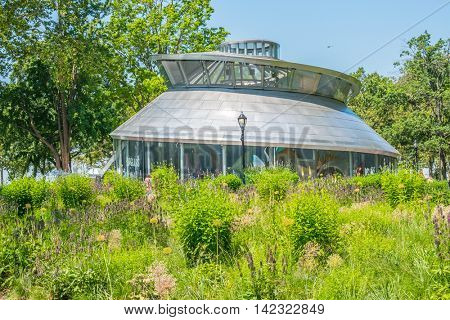 NEW YORK CITY, USA - JUNE 24, 2016: SeaGlass Carousel, a fish-themed carousel in Battery Park 