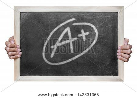 Woman hand hold grade a plus write on dirty blackboard isolated on white background