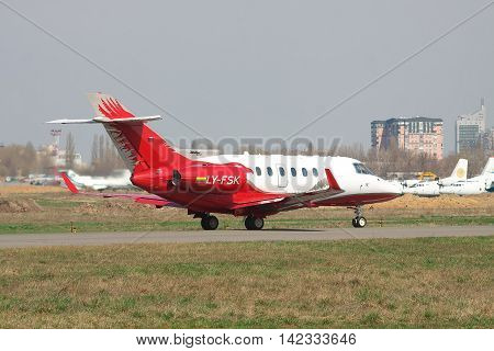 Kiev Ukraine - April 14 2012: Hawker 900XP Business Jet on the runway preparing for takeoff