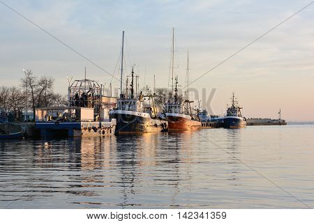 Fishing trawlers at sunset, Black Sea, Bulgaria
