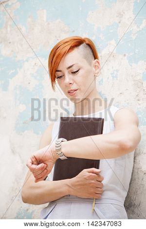 Young Red Hair Woman With File