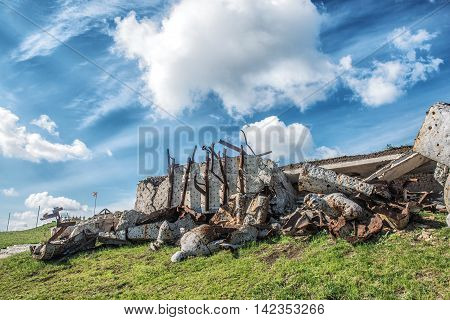 Monument to Soviet soldiers piled rubble destroyed after the hostilities of 2014. DNR Ukraine Saur-Tomb.