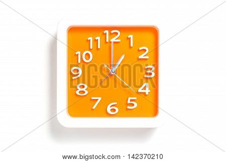 Orange White/Orange clock pointing at 1AM or 1PM