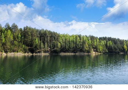 Beautiful autumn Alpine  lake and forest landscape