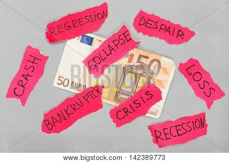 Euro banknote with paper red negative marks. Creative money concept