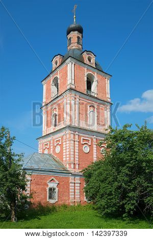 The old bell tower of the Epiphany Church of the Assumption Goritsky monastery sunny day in july. The Golden ring of Russia