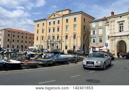 PIRAN, SLOVENIA - APRIL 14, 2014: Piran city and harbour on April 14, 2014 in Piran, Slovenia. Facing the Adriatic sea, it is the most popular coastal city of Slovenia.