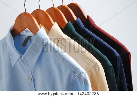 background of shirts hanging on a hanger