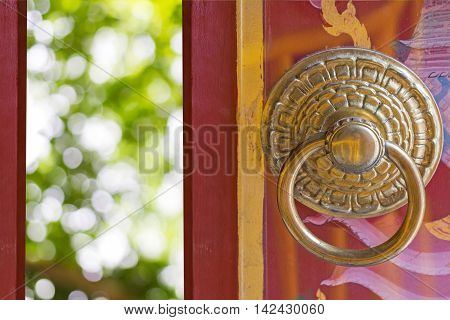 Chinese Traditional Wooden Door Opening green bokhe of nature background.