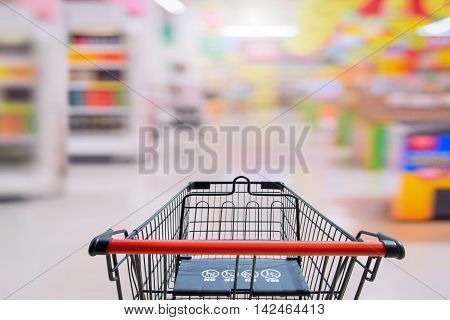 Shopping cart in supermarket. with baby safty sign on shoping car for Shopping Market  Background
