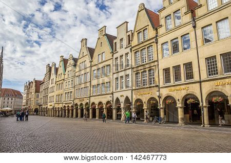 MUNSTER, GERMANY - AUGUST 7, 2016: Shops at the historical Prinzipal market square in Munster, Germany