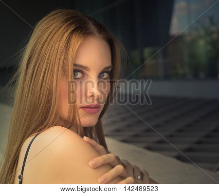 Beautiful young woman with straight hair