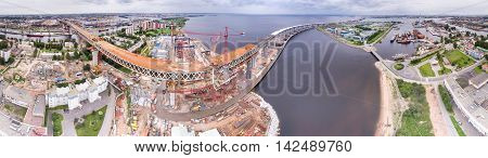 Aerial panoramic view of Kanonerskiy island in Saint-Petersburg, Russia with new high beltway
