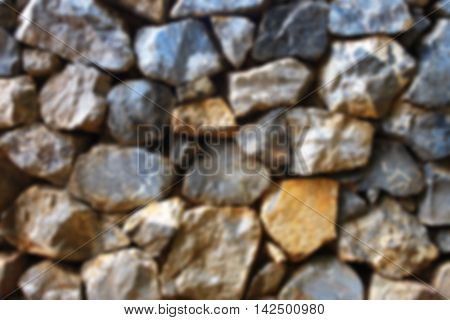 Old Rock Wall for background.(Blurry Texture Of Rock)