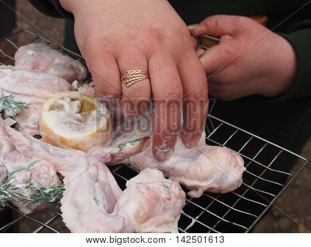 Cooking chicken wings on the grill. B-B-Q.