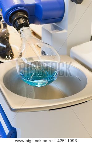 Glass Bulb Rotates In A Laboratory Evaporator.