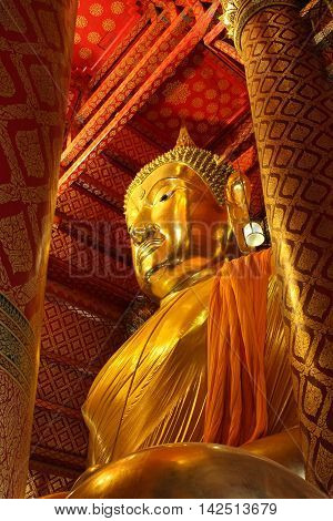 gold buddha statue in church at Ayutthaya thailand