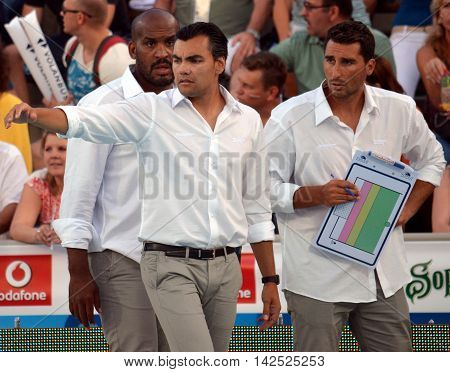 Budapest Hungary - Jul 15 2014. Gabriel HERNANDEZ spanish head coach with his assistant coaches. The Waterpolo European Championship was held in Alfred Hajos Swimming Centre in 2014.