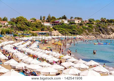 PAPHOS CYPRUS - JULY 24 2016: Coral Bay Beach one of the best sandy beaches located near Pegeia village