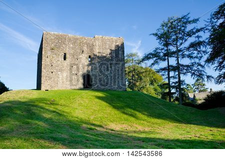 LYDFORD, DEVON. 13th August 2016. The castle in the Devon village of Lydford by evening light.