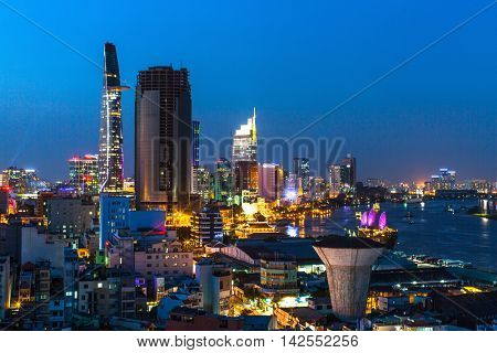 HO CHI MINH CITY, VIETNAM - CIRCA JAN, 2016: Top view of Saigon River at night time. Saigon River (the length of 256 kilometers) is most important to Ho Chi Minh City as it is the main water supply.
