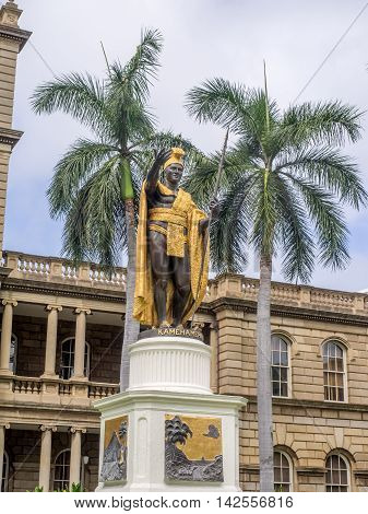 HONOLULU, HI - AUG 6: King Kamehameha I Statue, by Thomas Gould, on August 6, 2016 in Honolulu, Hawaii. It is in front of Ali iolani Hale, the Hawaii Supreme Court Building on King Street in Honolulu.