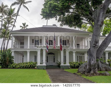 HONOLULU, HI - AUG 6: Washington Place on August 6, 2016 in Honolulu Hawaii. It is a Greek Revival palace in the Hawaii Capital Historic District in Honolulu, Hawaii. It is the governors residence.