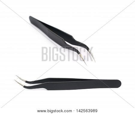 Black metal anti-static tweezers tool isolated over the white background, set of two different foreshortenings