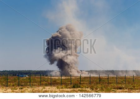 An explosion after a bombing at a military airfield.