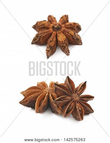 Pile of multiple Chinese star anise seeds, composition isolated over the white background, set of two different foreshortenings