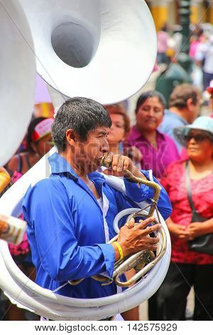 Lima, Peru-january 31: Unidentified Man Plays Sausaphone During Festival Of The Virgin De La Candela