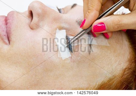 Woman On The Procedure For Eyelash Extensions, Eyelashes Lamination.