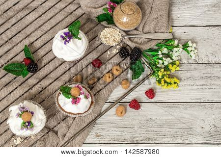 Beautiful Muffins With Berries On Wooden Background Nuts Honey