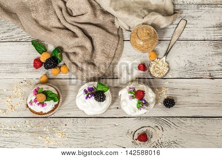 Beautiful Muffins With Berries On Wooden Background Nuts Honey