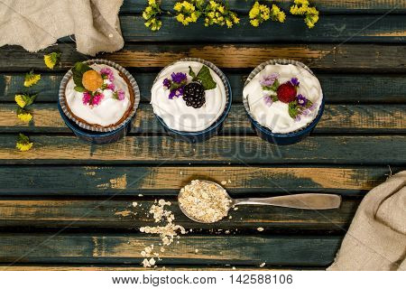 Beautiful Muffins With Berries On Wooden Background Nuts Honey