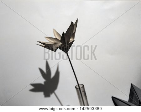 origami paper composition white background studio closeup