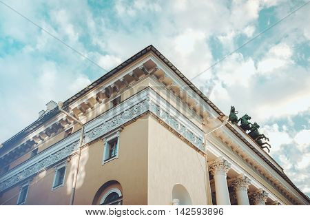 Saint-Petersburg Russia - August 12 2016: Element of the Alexandrinsky Theatre or Russian State Pushkin Academy Drama Theater on Ostrovsky Square with blue sky background.