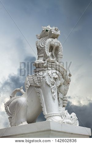 The imaginary animal had been situated in front of cloundscape background and symbolized to protection.
