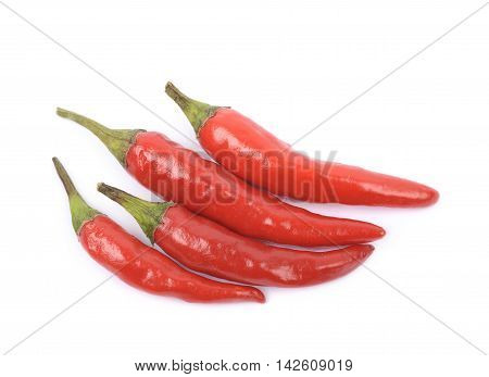 Pile of red italian peppers isolated over the white background